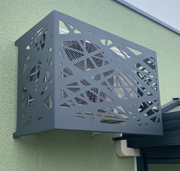 Grey wall-mounted AC cover